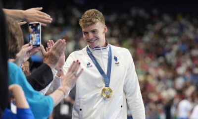 Léon Marchand wins Olympic gold in 400 IM and the admiration of France