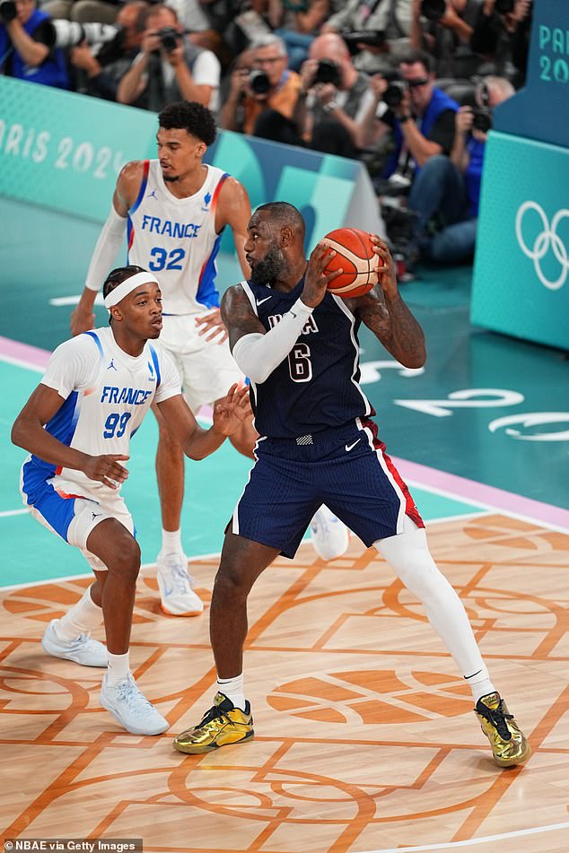 LeBron James (right) wore gold trainers during Team USA's Olympic final against France