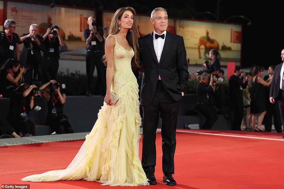 It was a double-date night as Brad's long-time buddy George, 63, was on the red carpet with his wife Amal, 46, an international human rights lawyer who turned heads in a glamorous yellow dress