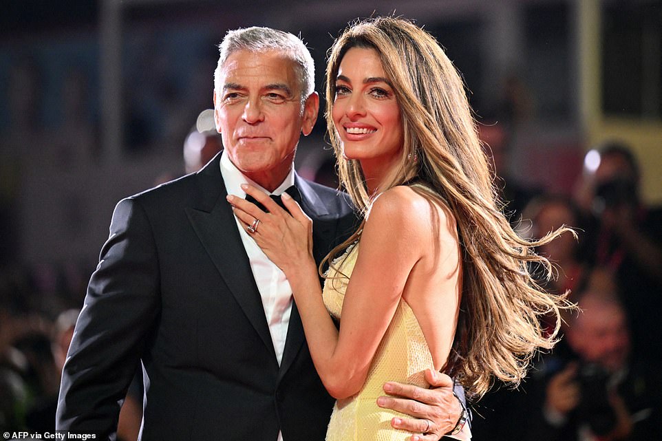 Amal and George put on a typically loved-up display