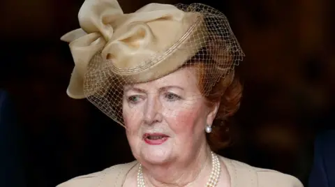 Getty Images Lady Helen Wogan in a hat at Sir Terry's memorial service