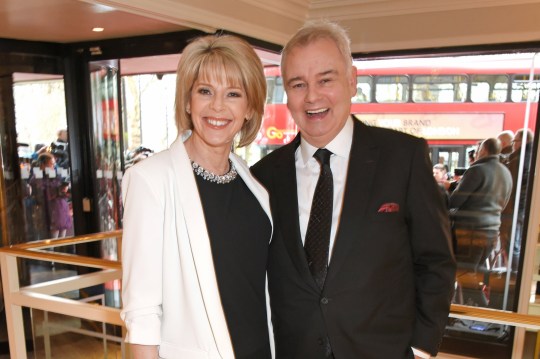 Ruth Langsford wearing a black dress and Eamonn Holmes in a suit at the TRIC Awards 