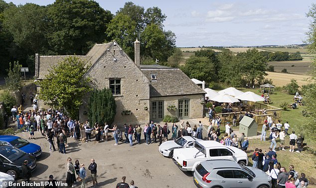 More than 400 people waited hours to be the first to enter Jeremy's new pub