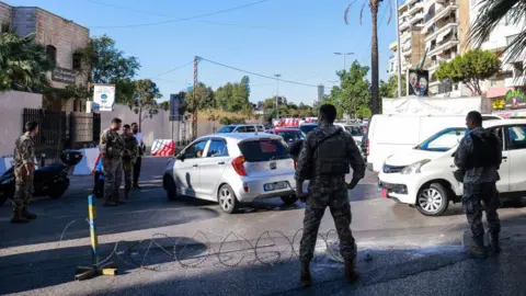 AFP Lebanese army soldiers block an entrance of a southern suburb of Beirut (17 September 2024)