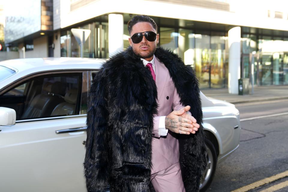 Reality TV star Stephen Bear arrives at Chelmsford Crown Court, Essex, where he is charged with voyeurism and two counts of disclosing private sexual photographs or films. The 32-year-old, who appeared in Ex On The Beach, is accused of secretly recording himself having sex with a woman and posting the footage online. Picture date: Tuesday December 6, 2022.