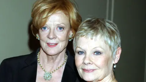 PA Dame Maggie Smith and Dame Judi Dench in 2001