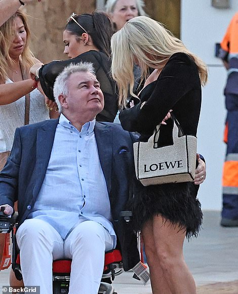 Eamonn Holmes proved that he was very much enjoying his new romance with girlfriend Katie Alexander as he was seen cheekily grabbing her bottom whilst on a romantic break