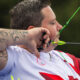 Kyle Tremblay pulls back an arrow preparing to shoot