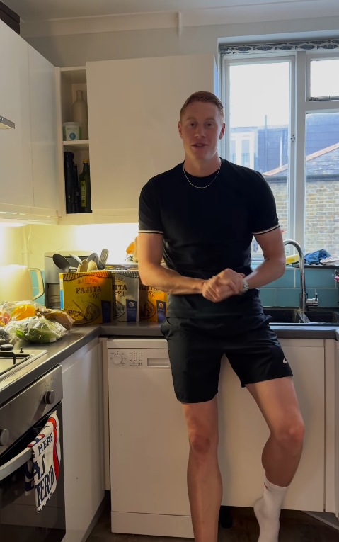 Tom Dean standing in his kitchen