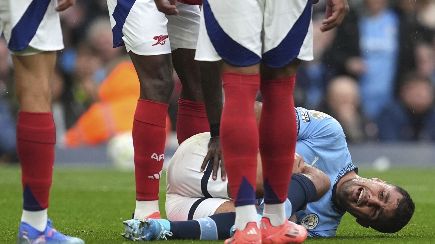 Rodri out 'for a long time' but Man City waits to learn extent of knee injury, Guardiola says