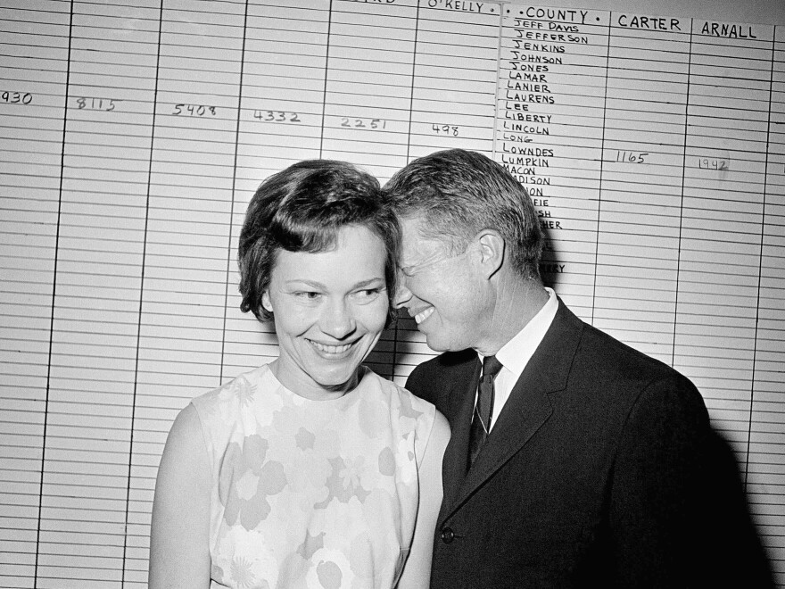 Jimmy Carter hugs his wife, Rosalynn, at his Atlanta campaign headquarters in September 1966, when he was a Georgia state senator and running for governor. They were married for 77 years. She died in November. 