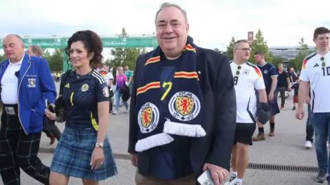 Getty Images Alex Salmond at the Euros in Germany with a Scotland scarf around his neck