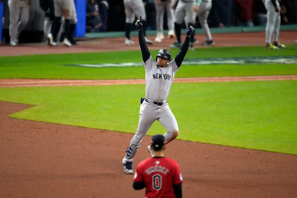 New York Yankees' Juan Soto celebrates after hitting a three-run home run against the...