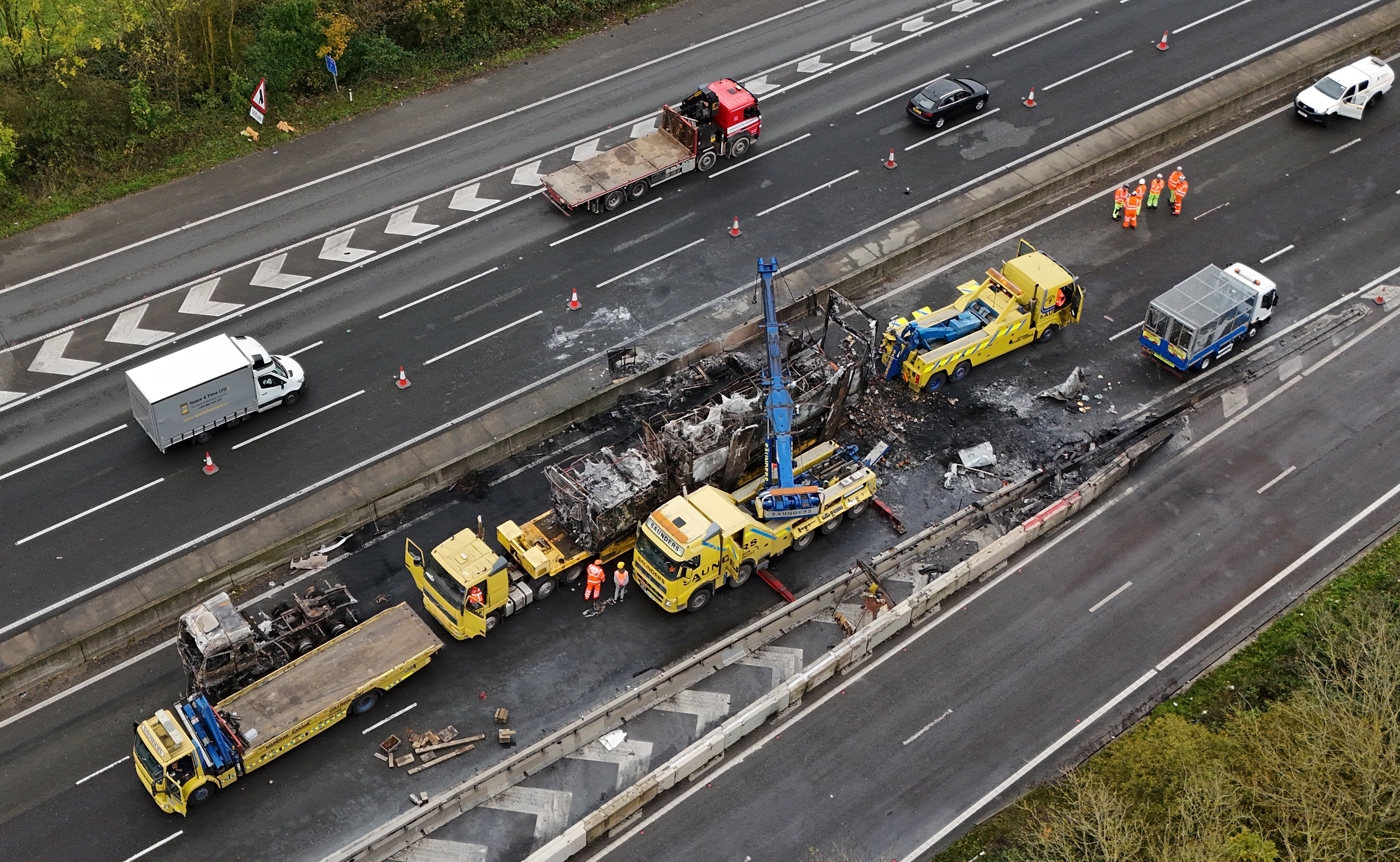 Recovery services at the scene on the M25 motorway between Junction 5 in Kent and Junction 6 in Surrey after a lorry fire