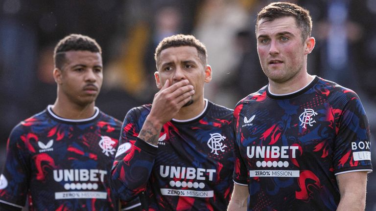 Rangers' Hamza Igamane (left), James Tavernier (middle) and John Souttar look dejected at full time.