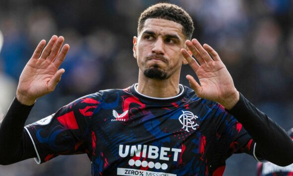 Rangers' Leon Balogun apologises to the fans at full time.