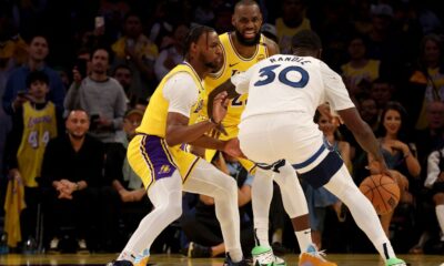 LeBron (middle) and his son (left) fulfilled a long-held ambition. Pic: Reuters