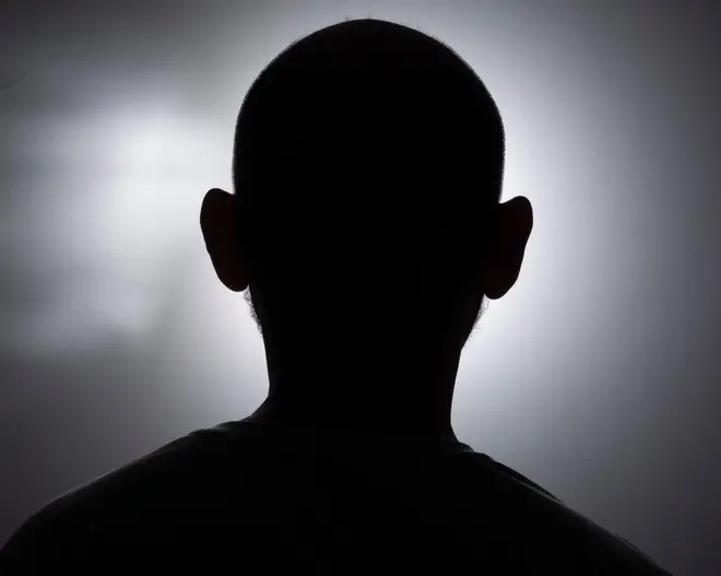 Close-up silhouette of a man's head in black and white. Salvador, Bahia, Brazil.