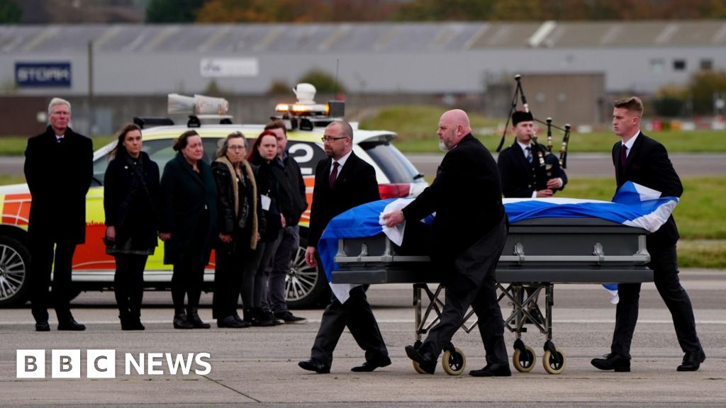 Alex Salmond's coffin arrives back in Scotland