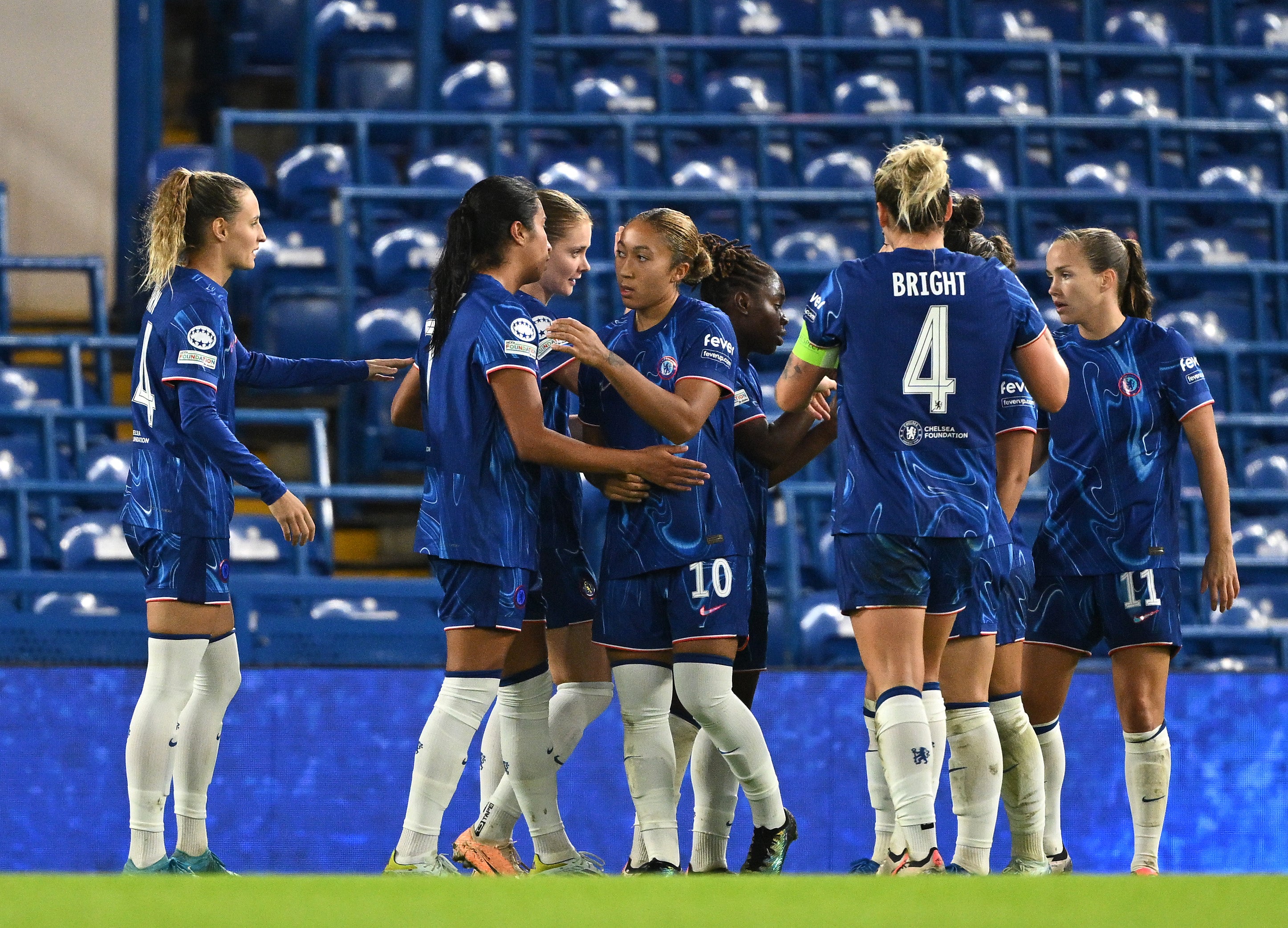 Mayra Ramirez of Chelsea celebrates with her teammates after scoring her team's third goal