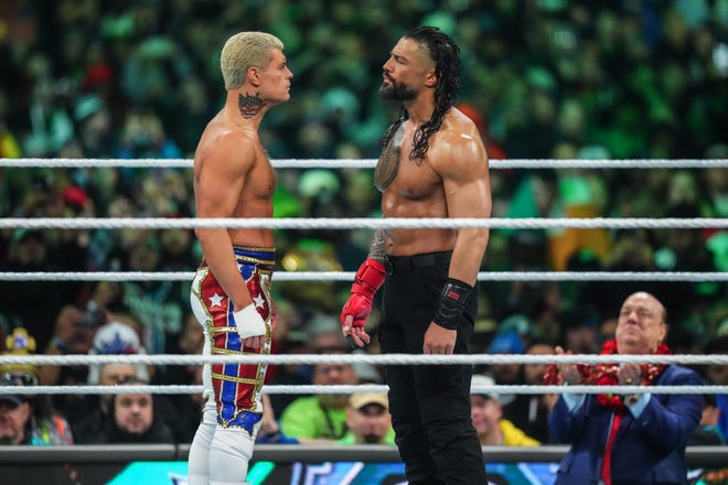 Cody Rhodes faces off with Roman Reigns during Night Two of WrestleMania 40 at Lincoln Financial Field on April 7, 2024 in Philadelphia, Pennsylvania.