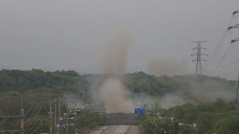 Smoke rises after North Korea blows up sections of inter-Korean roads on its side of the border.
Pic: South Korean Defence Ministry/Reuters
Pic:South Korean Defence Ministry/Reuters