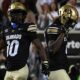 Sep 21, 2024; Boulder, Colorado, USA; Colorado Buffaloes wide receiver Omarion Miller (4) celebrates with wide receiver LaJohntay Wester (10) after a touchdown during the first half against the Baylor Bears at Folsom Field.