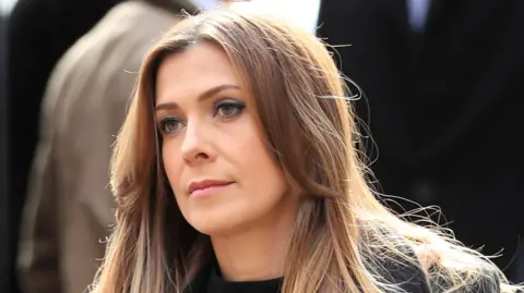 PA Media Kym Marsh dressed in black