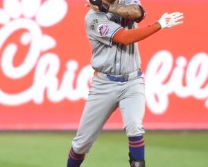 New York Mets third baseman Mark Vientos (27) reacts after driving in the tying run against the Philadelphia Phillies in the eighth inning in Game 1 of the NLDS at Citizens Bank Park.