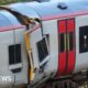 Passenger dies and 15 hurt as two trains crash