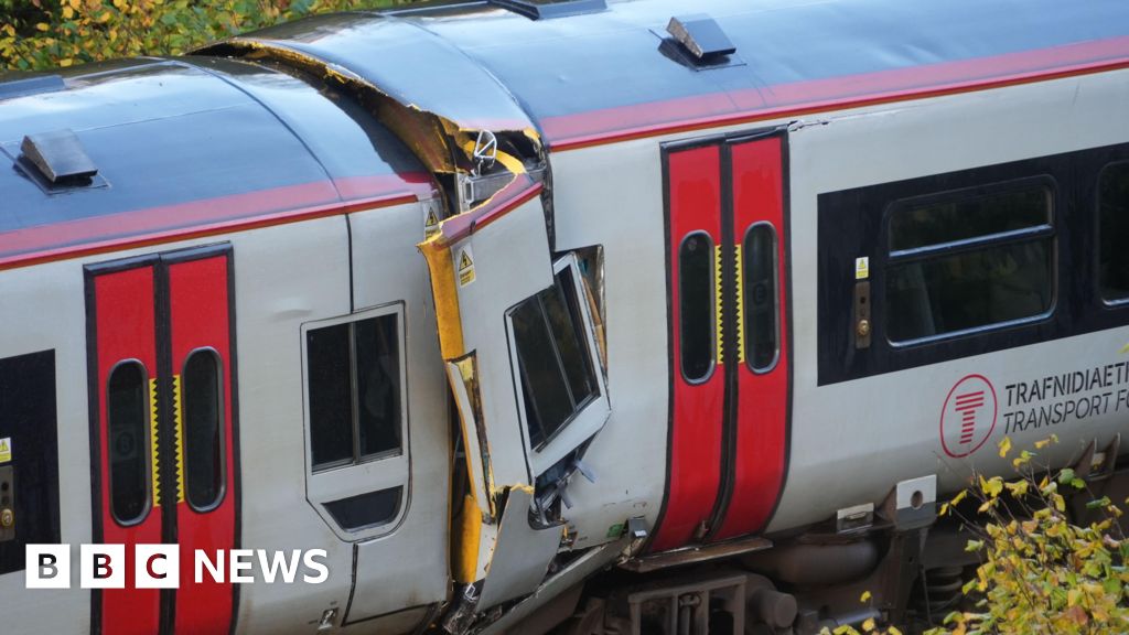 Passenger dies and 15 hurt as two trains crash