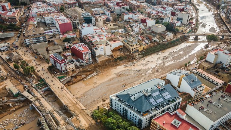 Mud covers the area in the aftermath of last Tuesday and early Wednesday storm that left hundreds dead or missing in the region, in Paiporta, outskirts of Valencia, Spain, Saturday, Nov. 2, 2024.(AP Photo/Angel Garcia)