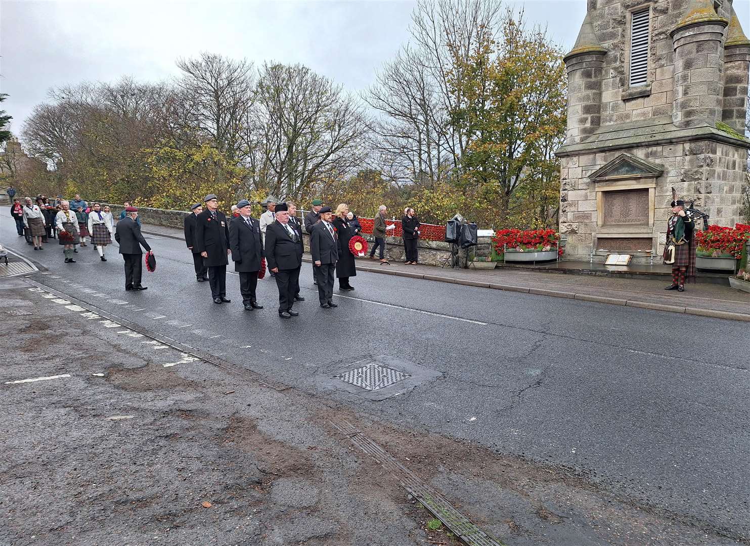 The parade arrives at Clyne War Memorial.