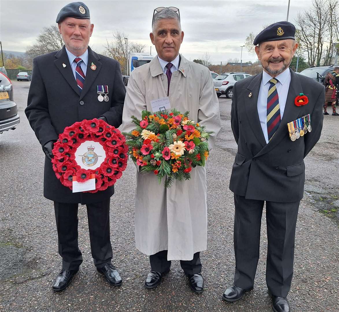 Ruwan Uduwerage-Perera (centre) laid a wreath on behalf of Brora Community Council, while Dom Turner, left, laid a wreath on behalf the Royal Air Force. Right is Lt Col Ducan Phimister who represented the Royal Army Medical Corps.