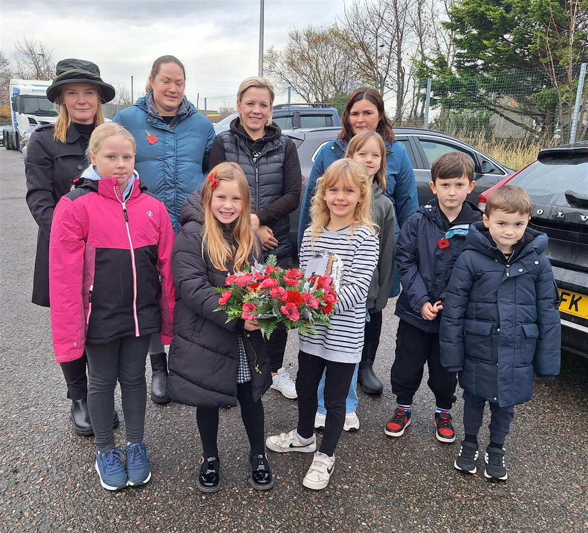 A wreath was laid by a group from Brora Primary School.