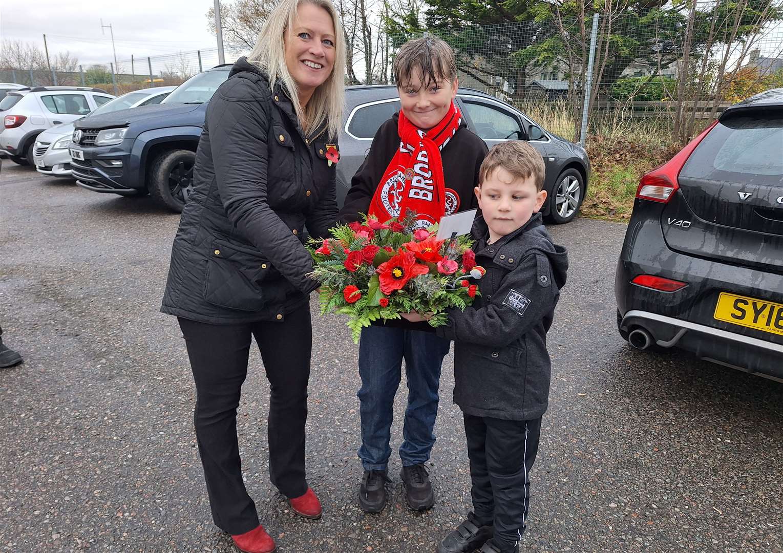 Mary Stewart along with Archie Sutherland and Harry Mackay laid a wreath on behalf of Brora Rangers Football Club.