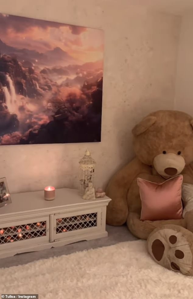 Meanwhile an enormous teddy bear sat in the corner