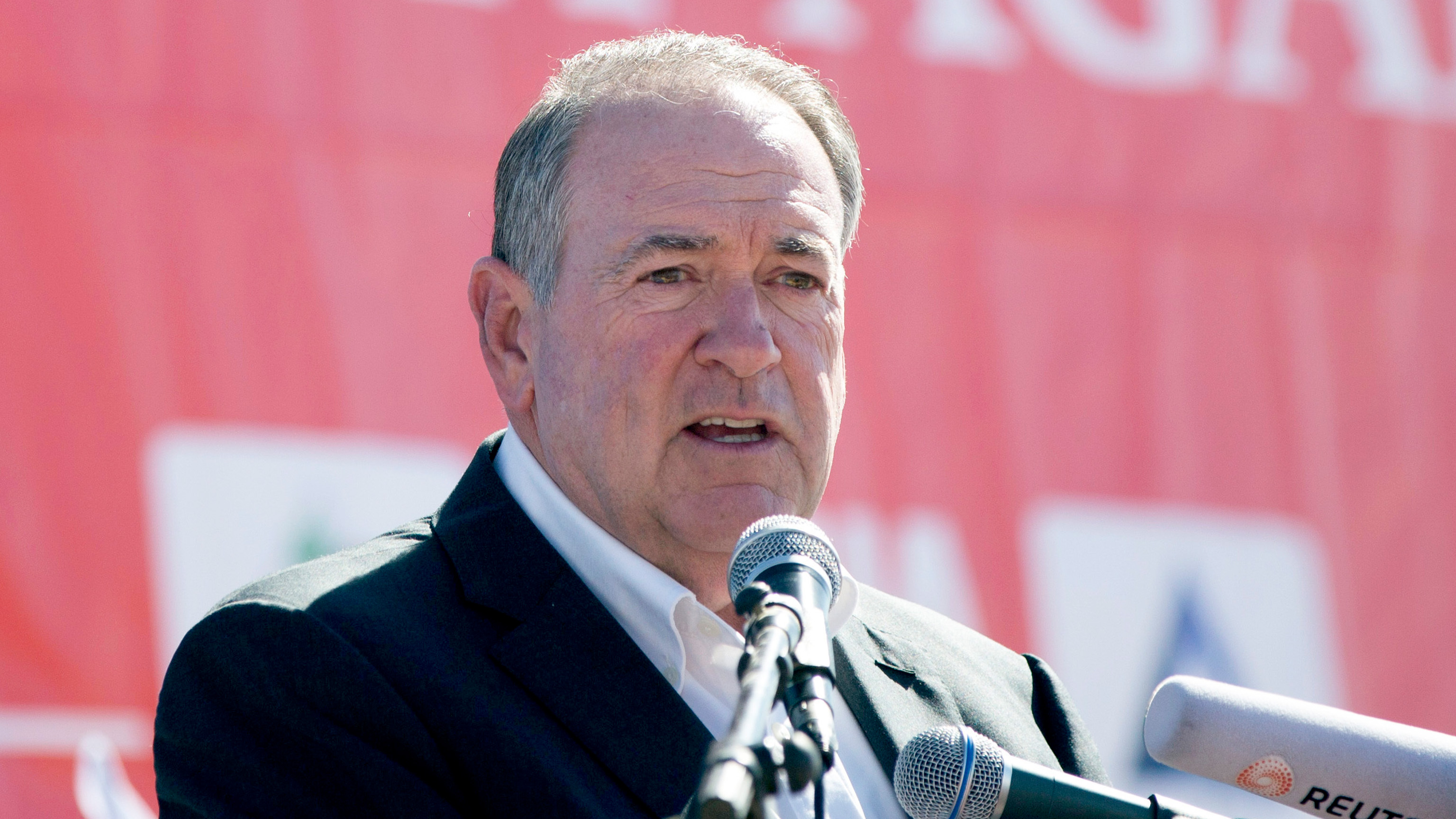 FILE - Arkansas Gov. Mike Huckabee speaks to the media in the West Bank settlement of Efrat, Aug. 1, 2018. 