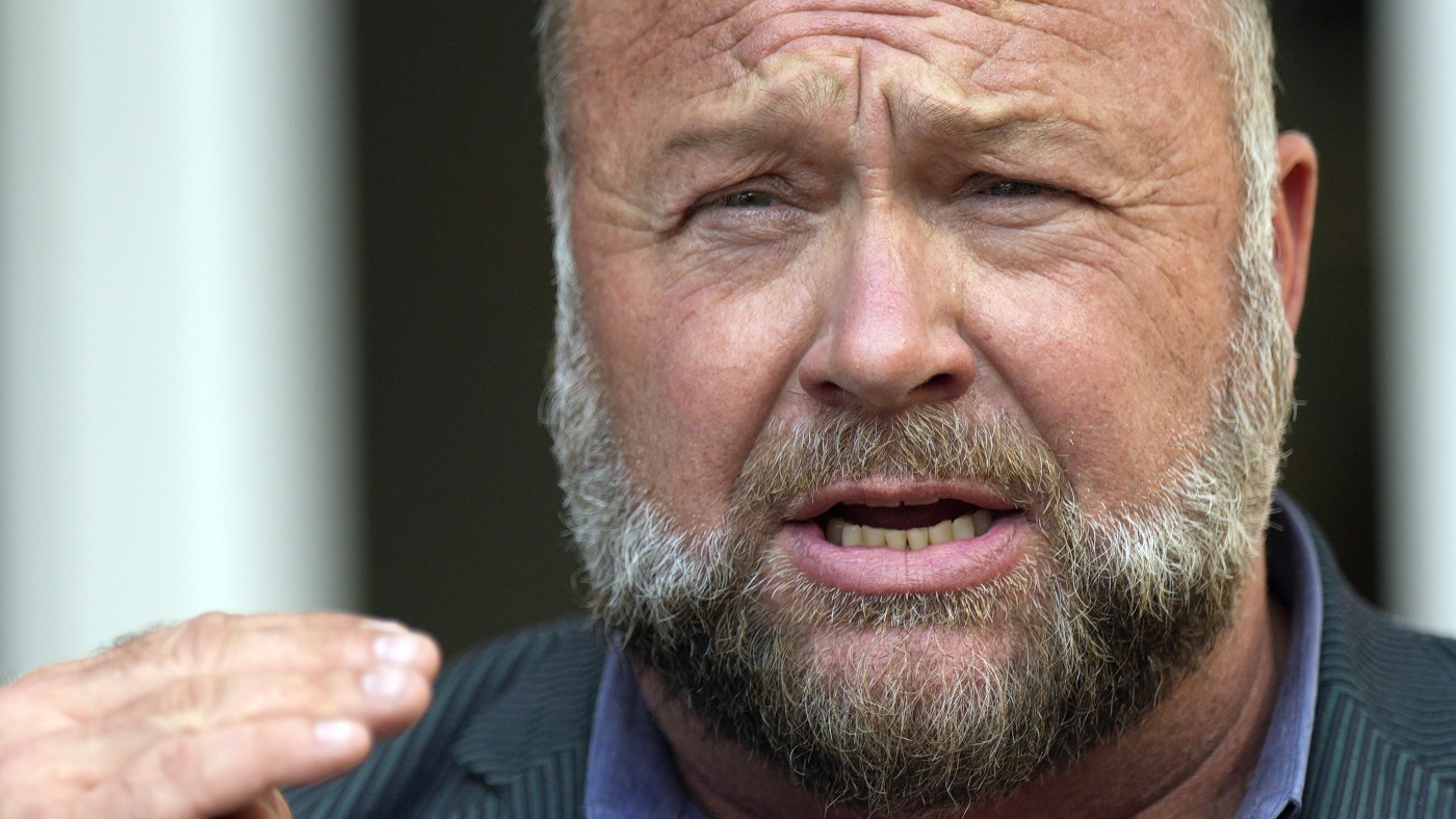 Alex Jones' Infowars sold to The Onion at auction : NPR