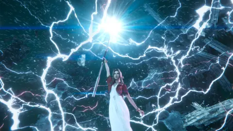 Square Enix Screenshot shows Aerith, a character in a long white dress and red leather jacket, holding a magical staff in the air as lightning bolts crackle around her