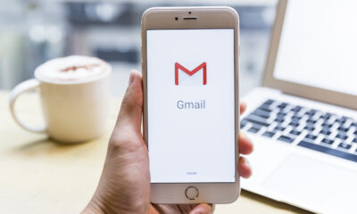 Stock image of Gmail logo on phone.