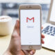 Stock image of Gmail logo on phone.