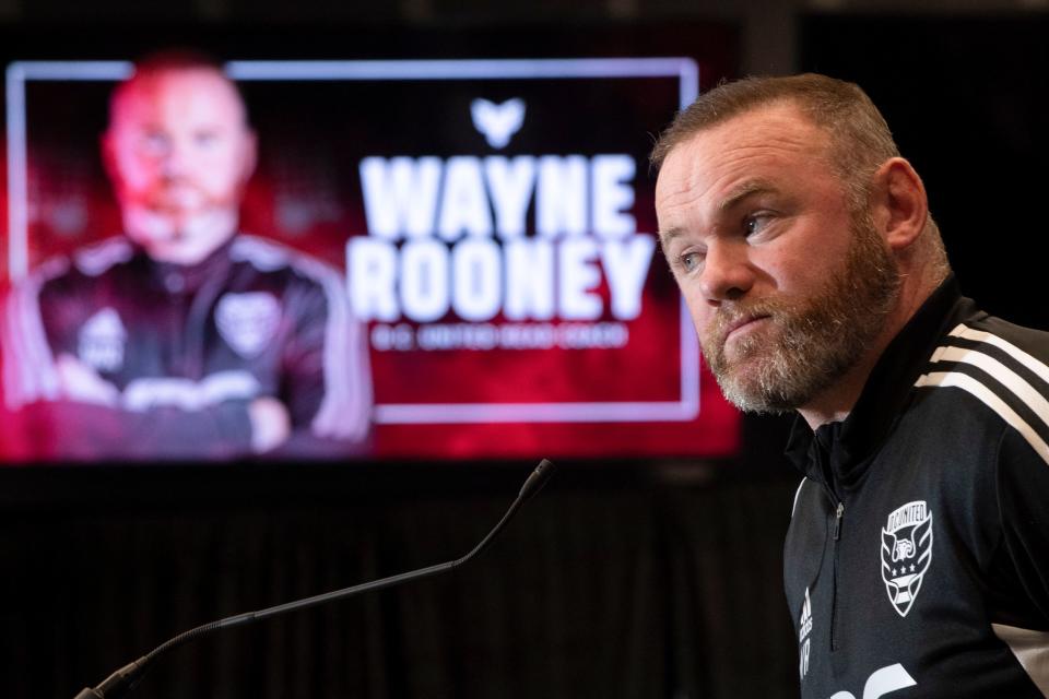 British soccer star Wayne Rooney speaks during a press conference where he was announced as the new Head Coach of Major League Soccer's DC United at Audi Field in Washington, DC, on July 12, 2022. - Former England and Manchester United star Wayne Rooney was named on Tuesday as the new head coach of DC United and tasked with reviving the moribund Major League Soccer team. (Photo by ROBERTO SCHMIDT / AFP) (Photo by ROBERTO SCHMIDT/AFP via Getty Images)