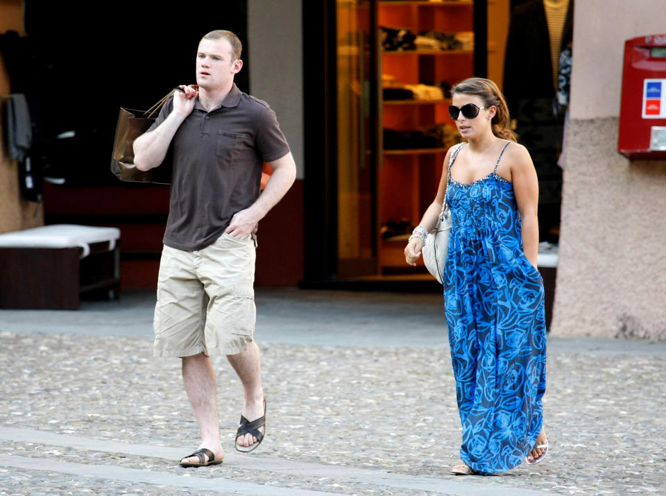 PORTOFINO, ITALY - JUNE 09:  Wayne Rooney and Coleen McLoughlin walk in the main square of Portofino on June 09, 2008 in Portofino, Italy.  (Photo by Felix Magno/Getty Images)