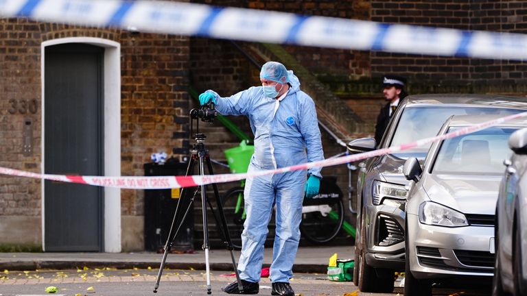 A police forensic officer at the scene on Southern Grove. 
Pic: PA