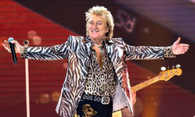 Rod Stewart gestures onstage at the Royal Arena during his "One Last Time" concert in Copenhagen, on Sunday, June 9, 2024. (Torben Christensen/Ritzau Scanpix via AP)