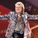 Rod Stewart gestures onstage at the Royal Arena during his "One Last Time" concert in Copenhagen, on Sunday, June 9, 2024. (Torben Christensen/Ritzau Scanpix via AP)