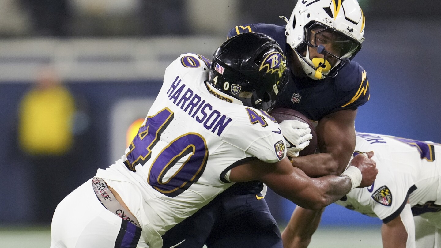 Chargers struggle to score after RB J.K. Dobbins hurts his knee in his reunion game with Ravens