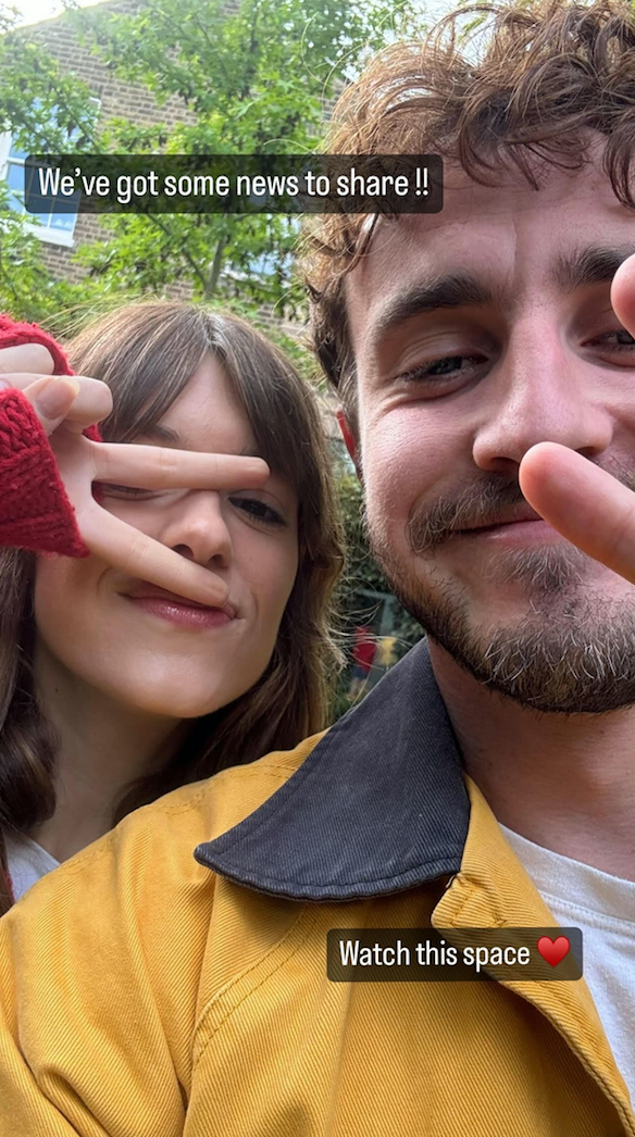 a man and woman taking a selfie