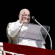 Pope Francis waves to pilgrims gathered in St. Peter’s Square from his window in the Apostolic Palace during his Angelus address on the Solemnity of All Saints, Nov. 1, 2024.